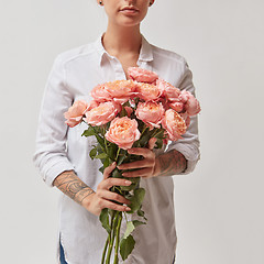 Image showing Girl with bouquet of flowers