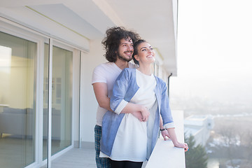 Image showing Couple hugging on the balcony