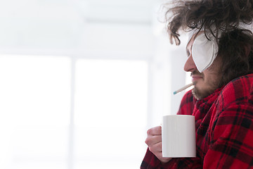 Image showing young Man with flu and fever