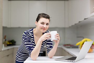 Image showing woman drinking coffee enjoying relaxing lifestyle