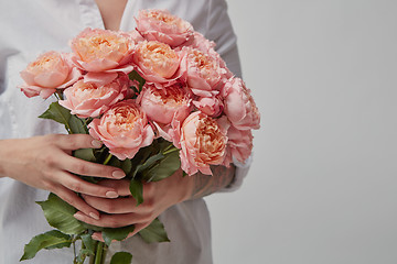 Image showing Girl with bouquet of flowers