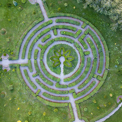 Image showing Aerial view of a natural labyrinth round shape in the garden. Photo from the drone.