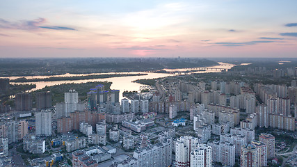 Image showing A bird\'s eye view, aerial panoramic view from drone to the Darnyts\'kyi district of Kiev, Ukraine and view to the right bank of Dnieper at sunset in the summer.