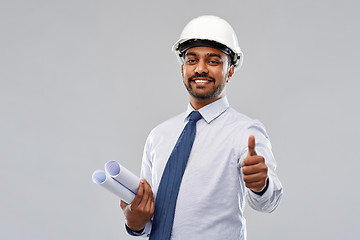 Image showing architect or businessman in helmet shows thumbs up