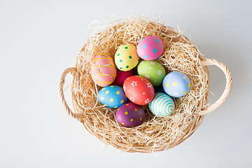 Image showing colored easter eggs in basket