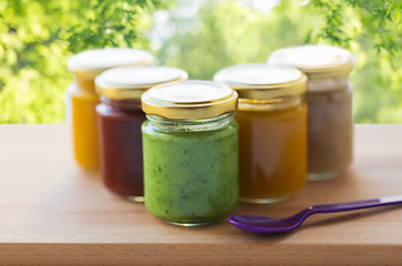 Image showing vegetable or fruit puree or baby food in jars