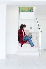 Image showing freelancer in bathrobe working from home