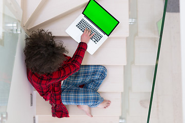 Image showing freelancer in bathrobe working from home