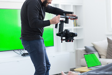 Image showing videographer at work