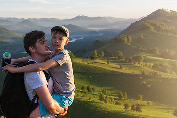 Image showing Happy father and son in the Altai mountains