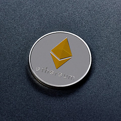 Image showing One silver coin is ethereum on a black background. Worldwide Crypto-Currency