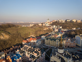 Image showing District Vozdvizhenka on Podol with modern houses and a bald mountain, the city of Kiev Ukraine.