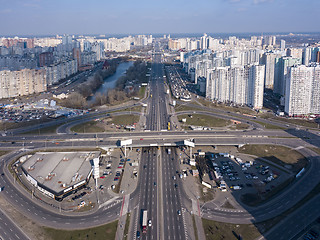 Image showing A bird\'s eye view, aerial panoramic view from drone to the Kharkivskiy district of Kiev, Ukraine with highway, road junction and modern buildings.