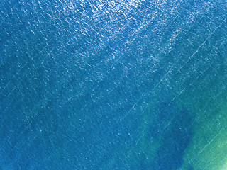 Image showing Aerial photography from the drone sea blue surface. Natural summer background