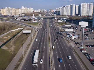 Image showing Panoramic aerial view from drone Pozniaky district, Mykoly Bazhana Ave with traffic and modern building of the city Kiev Ukraine.