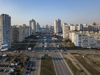 Image showing Aerial panoramic view from drone to Kharkivskiy district with modern building of the city Kiev ukraine in a sunny spring day.