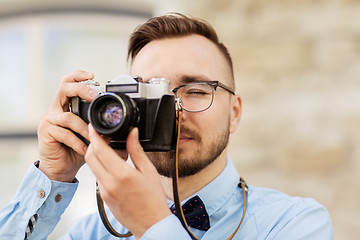 Image showing photographer or hipster with film camera outdoors