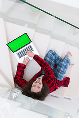 Image showing freelancer in bathrobe working from home