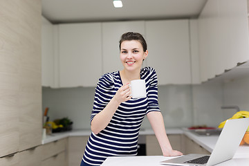 Image showing woman drinking coffee enjoying relaxing lifestyle