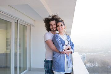 Image showing Couple hugging on the balcony