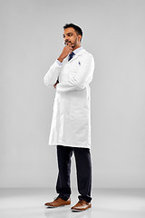 Image showing smiling male doctor or scientist in white coat