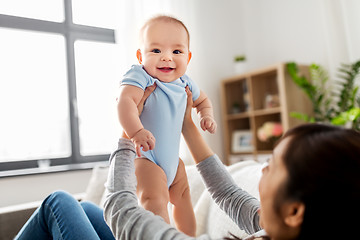 Image showing happy mother with little baby son at home