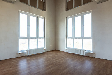 Image showing Room interior with two corner stained glass windows