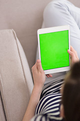 Image showing woman on sofa using tablet computer