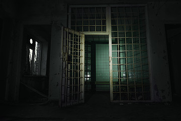 Image showing Old abandoned prison cell in the dark