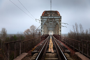 Image showing Abandoned railroad bridge angle shot