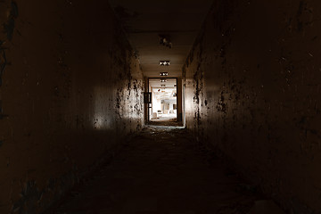 Image showing Abandoned hallway with light at the end