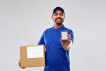 Image showing indian delivery man with smartphone and parcel box