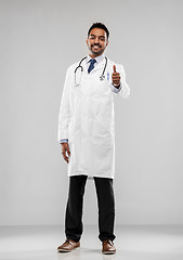 Image showing smiling indian male doctor showing thumbs up