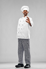 Image showing happy male indian chef in toque showing ok gesture