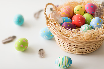 Image showing close up of colored easter eggs in basket