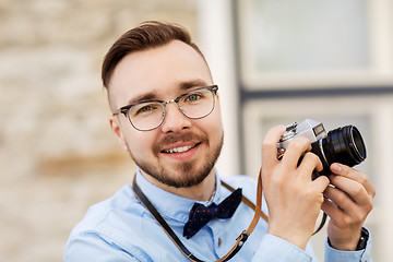 Image showing photographer or hipster with film camera outdoors