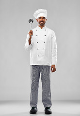 Image showing happy male indian chef in toque with ladle