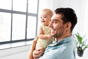 Image showing father with little baby daughter at home