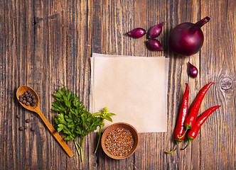 Image showing Spices for cooking on a wooden table