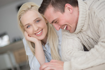 Image showing Young Couple using digital tablet on cold winter day