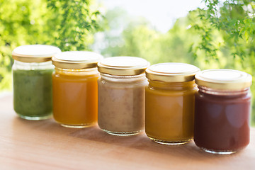 Image showing vegetable or fruit puree or baby food in jars