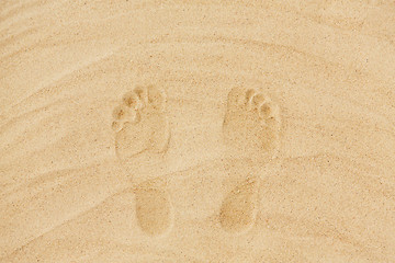 Image showing footprints in sand on summer beach