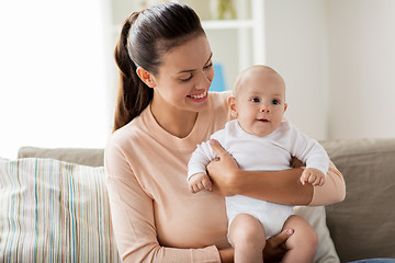 Image showing happy mother with little baby boy at home