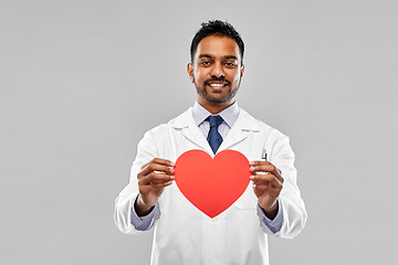 Image showing smiling indian male doctor with red heart shape