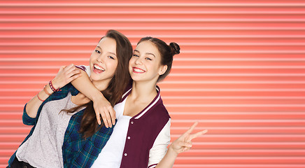 Image showing teenage girls or friends hugging and showing peace