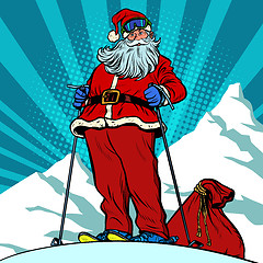 Image showing Skier in the mountains Santa Claus character merry Christmas and happy new year