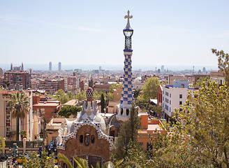 Image showing Barcelona, Spain - April 15, 2013: The famous architectural gatehouse at the main entrance to the Park Guell against the sky Barcelona