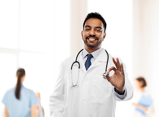 Image showing smiling indian male doctor showing ok gesture