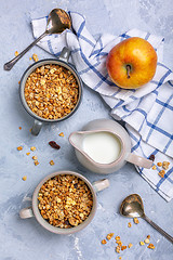 Image showing Granola baked with apple. Healthy breakfast.