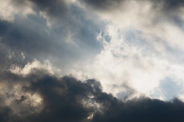 Image showing Stormy sky with sunlight at sunset